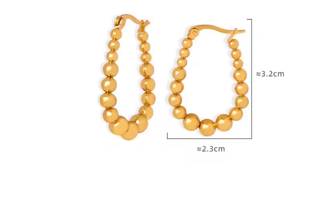 Graduated Bead Oval Hoop Earrings — Gold