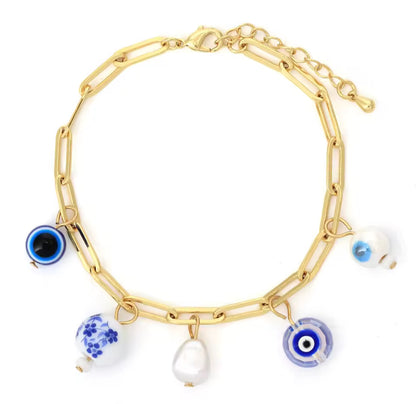 Gold Paperclip Chain Bracelet with Evil Eye & Whimsical Charms