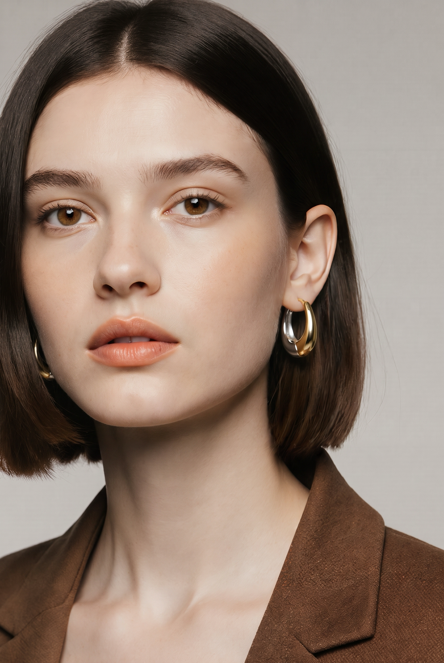 Reversible Two-Tone Hoop Oval Earrings – 18K Gold & Silver Stainless Steel